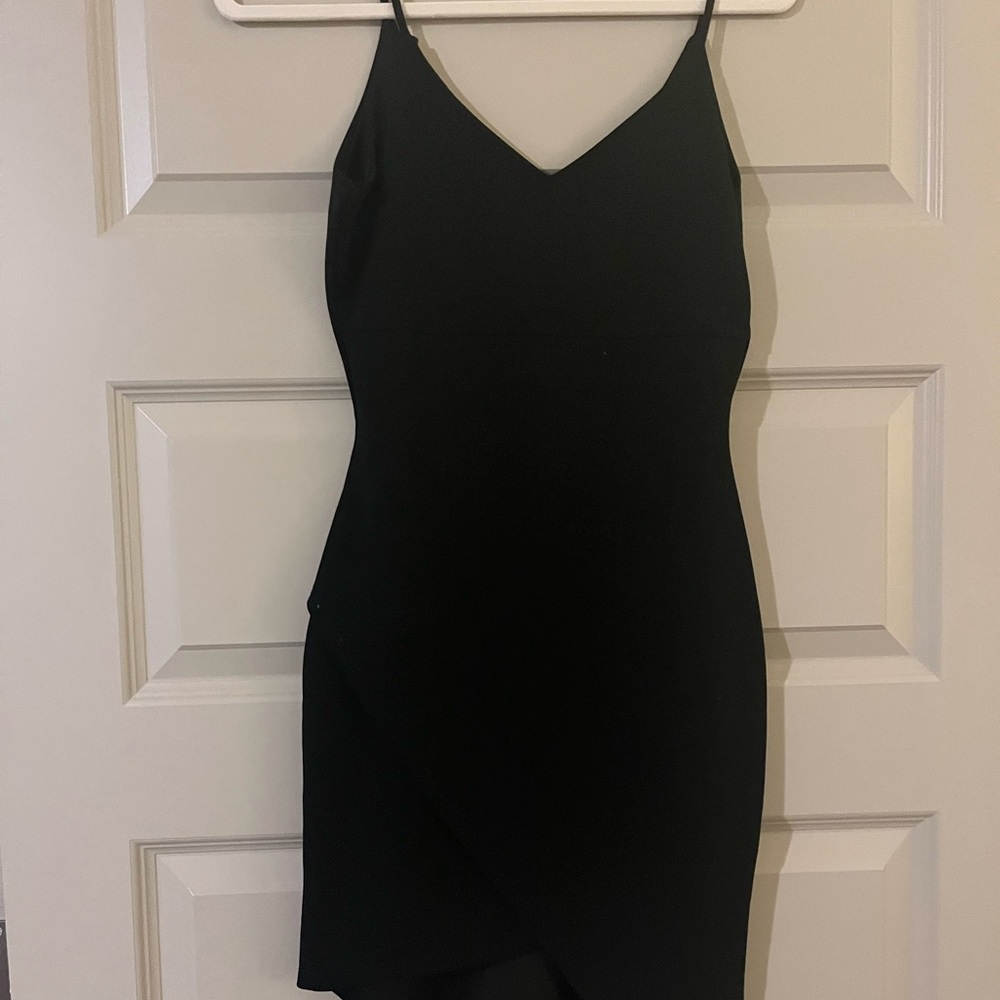 Black body con mini dress. A symmetrical in front